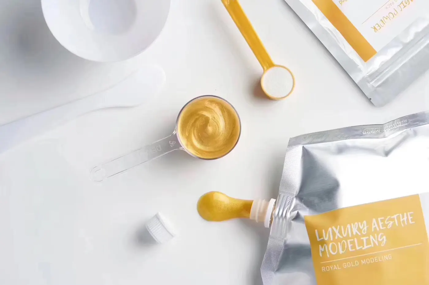 Dermabell gold-tone retail packaging